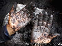 Building biomass bricks by hand